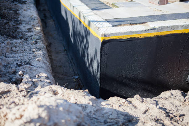 Professional Wet Basement Repair technician working in Lawrenceville, IL
